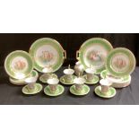 A 20th century Vienna tea service, comprising two bread and butter plates, ten side plates, seven