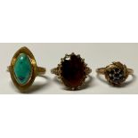 A 9ct gold dress ring, set with a polished lozenge shaped turquoise stone, size Q/R, marked 375, 4g;