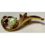 A gold brooch, set with a single polished opal cabochon, marks rubbed/indistinct, 3.97g