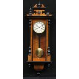 A late 19th century walnut and ebonised Vienna wall clock, by Junghans, 91.5cm high, 33.5cm wide,