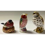 A Royal Crown Derby paperweight, Song Thrush, gold stopper; others, Bullfinch Nesting, gold stopper;