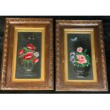 A pair of oak framed engraved wall mirrors, each painted with a floral bouquet and butterflies, 83cm