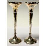 A pair of George V silver trumpet shaped posy vases, flared everted rims, 20cm, Birmingham 1915,