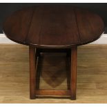 A mahogany 'wake table' design mahogany low sitting room coffee table, 53cm high, 152cm long, 46cm