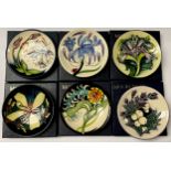 A Moorcroft Blue Mist pattern circular dish, 6cm, boxed; others, Fly Away Home, Isis, Snowberry,