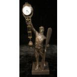 A bronzed metal mystery clock modelled as an aviator, approx. 38cm high
