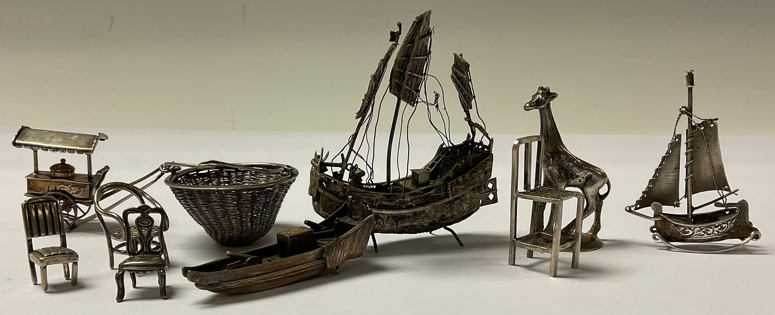 A Chinese silver filigree miniature model of a junk, 8cm high; other Chinese and Continental