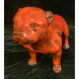 An Anita Harris art pottery model of a Staffordshire Bull Terrier, signed in gold, 34cm long