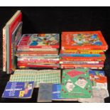 A collection of 1960's children's annuals and books including The Beano, Rupert, Lion, Roy of the
