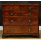 A 19th century mahogany chest, of two short and three long graduated drawers, skirted base,