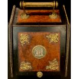 A 19th century walnut and ebonised purdonium/coal box, the hinged cover set with Sèvres plaque, c.