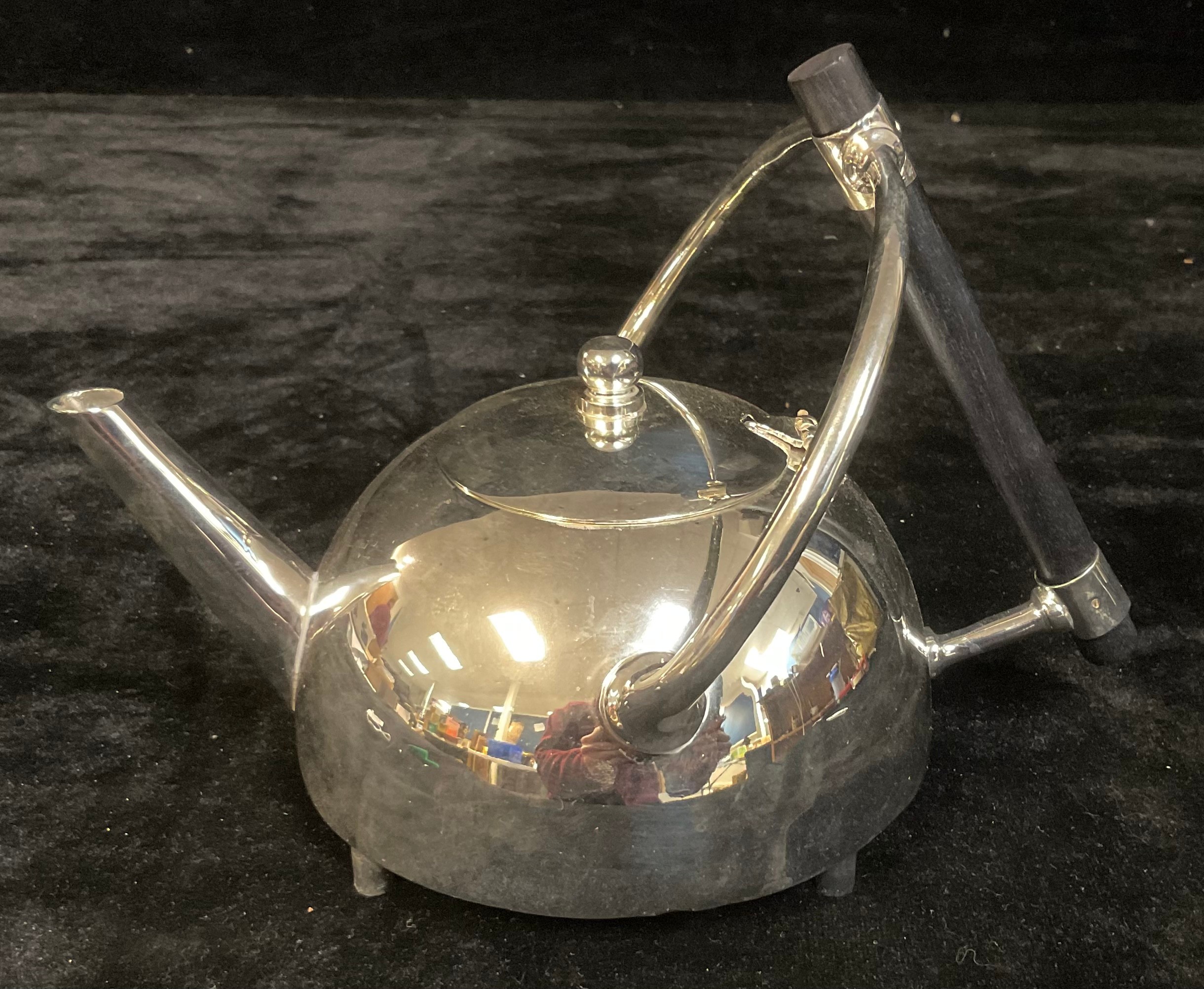 A reproduction 'Arts and Crafts' style plated coffee pot, in the manner of Christopher Dresser, 14cm