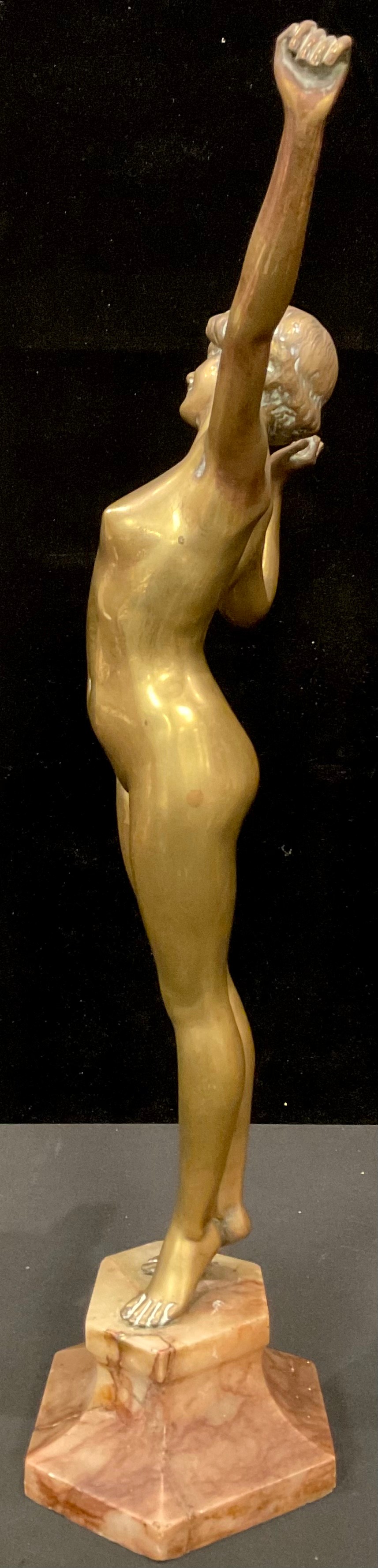 An Art Deco style brass figure, female nude on tiptoes mid stretch, angular onyx base, 55cm - Image 4 of 4