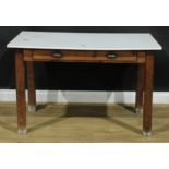 An early 20th century pine and melamine kitchen table, rectangular top above a long frieze drawer,