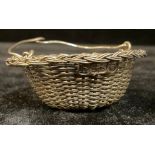 A George III silver sweetmeat basket, London 1783
