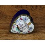 A 19th century Continental enamel heart shaped snuff box, hinged cover decorated in polychrome