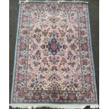 A Wilton wool/Laine rug with foliage in red blue and yellow 180cm x 270 cm