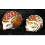 A Royal Crown Derby paperweight, Orchard Hedgehog, gold stopper, boxed; another, Bramble Baby