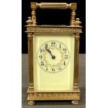 A 19th century lacquered brass carriage timepiece, Arabic numerals with painted floral swags, off-