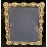 A large Elizabeth II silver shaped rectangular easel photograph frame, 32cm high, Sheffield 2006