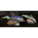 A pair of Royal Crown Derby paperweights, Lyme Bay Mother and Baby Dolphin, designed by Tien Manh