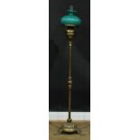 A late 19th/early 20th century floor standing oil lamp, 164cm high overall