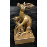 A Chinese gilt metal two piece seal as a stag with fawn, 13cm high, 20th century