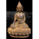 A contemporary gilt bronzed metal figure, Buddha seated cross legged, 14cm high