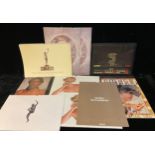 A collection of Pirelli calendars, comprising 1973, 1974, 1984, 1985, 1986, 1986, 1987, 1988,