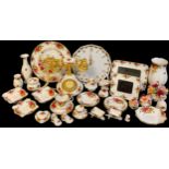 A Royal Albert Old Country Roses pattern telephone, two photograph frames, miniature teapot with cup