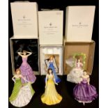 A Royal Doulton figure, Pretty Ladies, Blossomtime, HN 5096, 17.5cm, boxed; others, Sara HN5439,