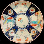 A Worcester Sir Joshua Reynolds pattern saucer dish, decorated with alternating panels with a long