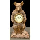 Novelty black forest type timepiece carved as a bear, mechanical movement, 30cm high