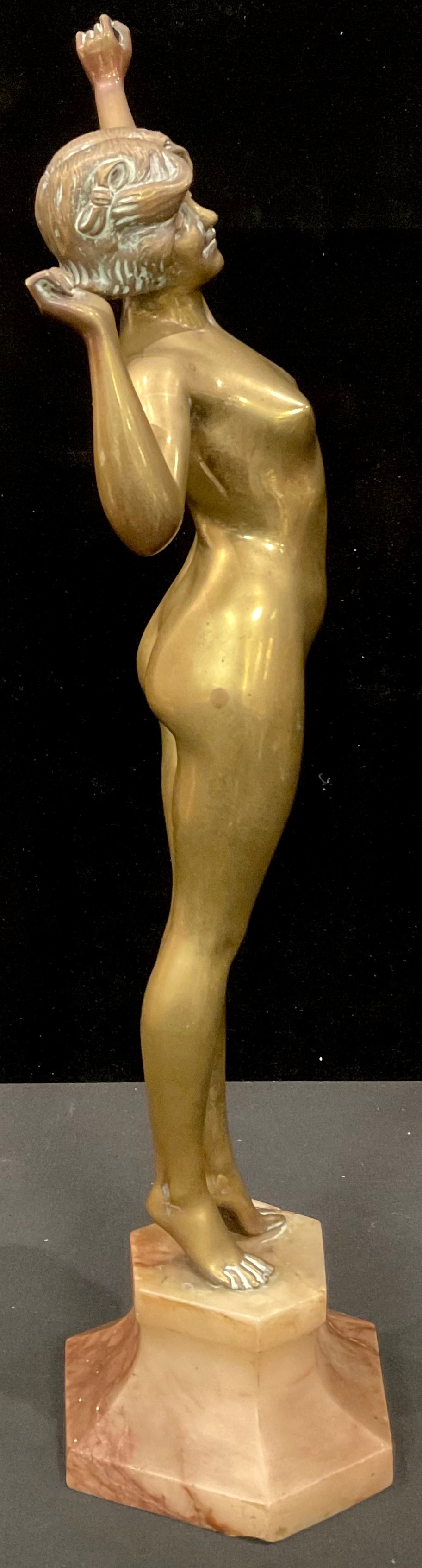 An Art Deco style brass figure, female nude on tiptoes mid stretch, angular onyx base, 55cm - Image 2 of 4