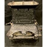 A cast iron Truman's Lamp Stove, integral burner, 28cm high