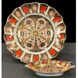 A Royal Crown Derby 1128 pattern shaped circular plate, 21.5cm diameter, first quality; a navette