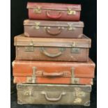 An early 20th century leather suitcase; others, early to mid 20th century (5)