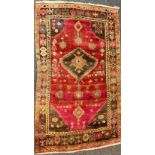 A Middle Eastern Hamadan carpet, 86" x 53"