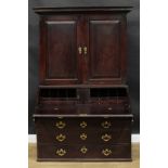 A George III red walnut and mahogany bureau book cabinet, for restoration, 190.5cm high, 127cm wide,