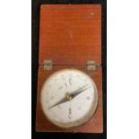 A 19th century mahogany travelling pocket compass