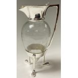 A contemporary 'Arts and Crafts' style silver plate mounted claret jug, in the manner of Christopher