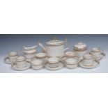 A Derby tea service, comprising fluted teapot and stand, sucrier and cover, milk jug, seven tea