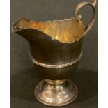 An Edward VII silver sparrow beak cream jug, scroll handle, monogrammed, 10cm, Chester 1903, 79.8g