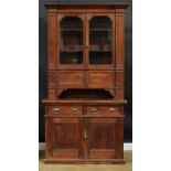 A late 19th/early 20th century pine library bookcase, 230.5cm high, 124.5cm wide, 54cm deep