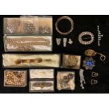 A sterling silver and polished amber bracelet and earrings suite, marked 925, boxed; other costume