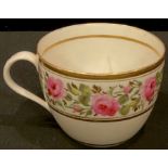 A Pinxton Bute-shaped teacup, painted with pink roses, green leaves and gilt foliage, gilt line