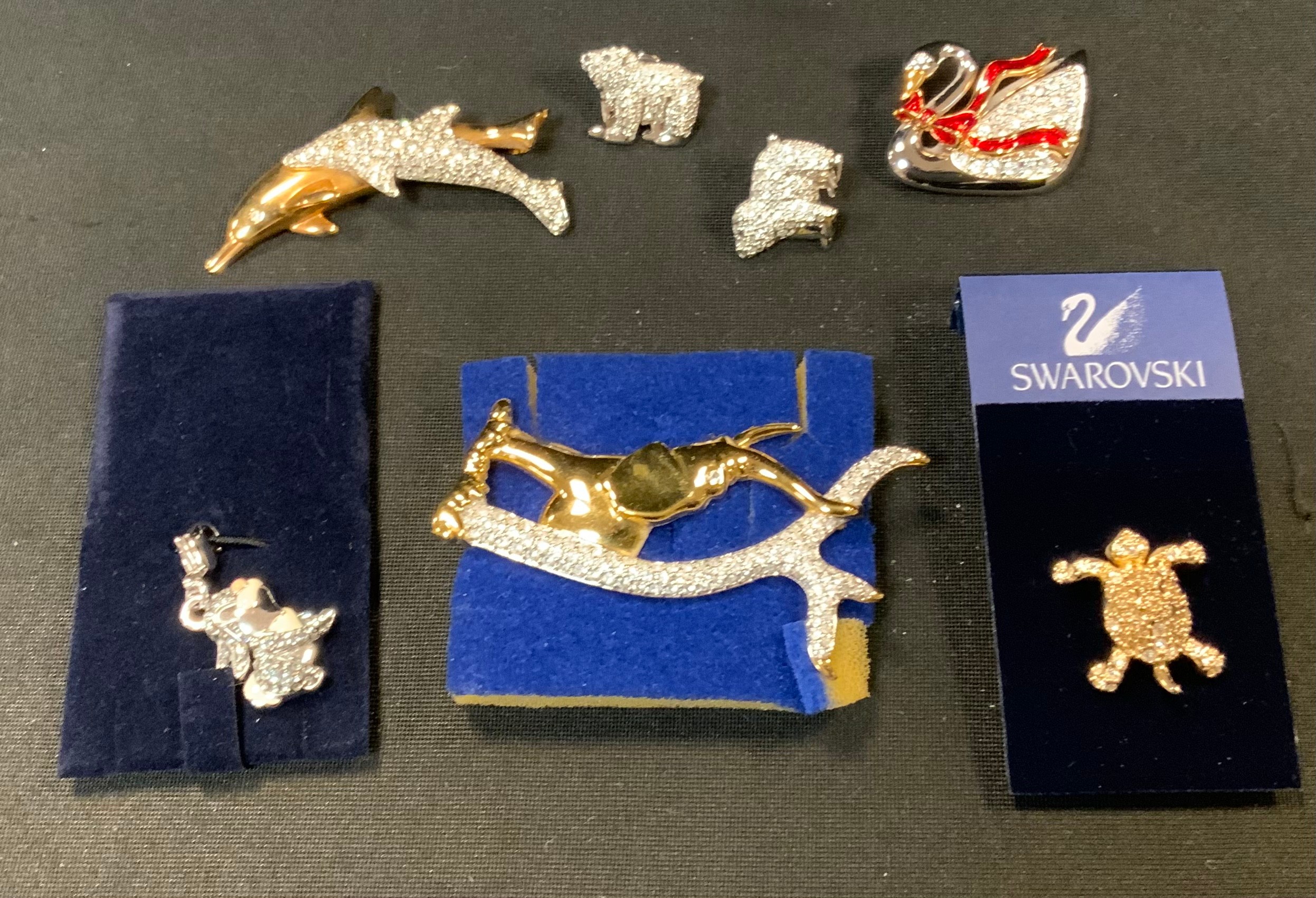 Swarovski Crystal Jewellery - Elephant and tree branch brooch; others, Leaping Dolphin, Swan,