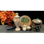 A Chinese famille noir covered jar, floral decoration, 23cm high; satsuma jar and cover; Tamini /