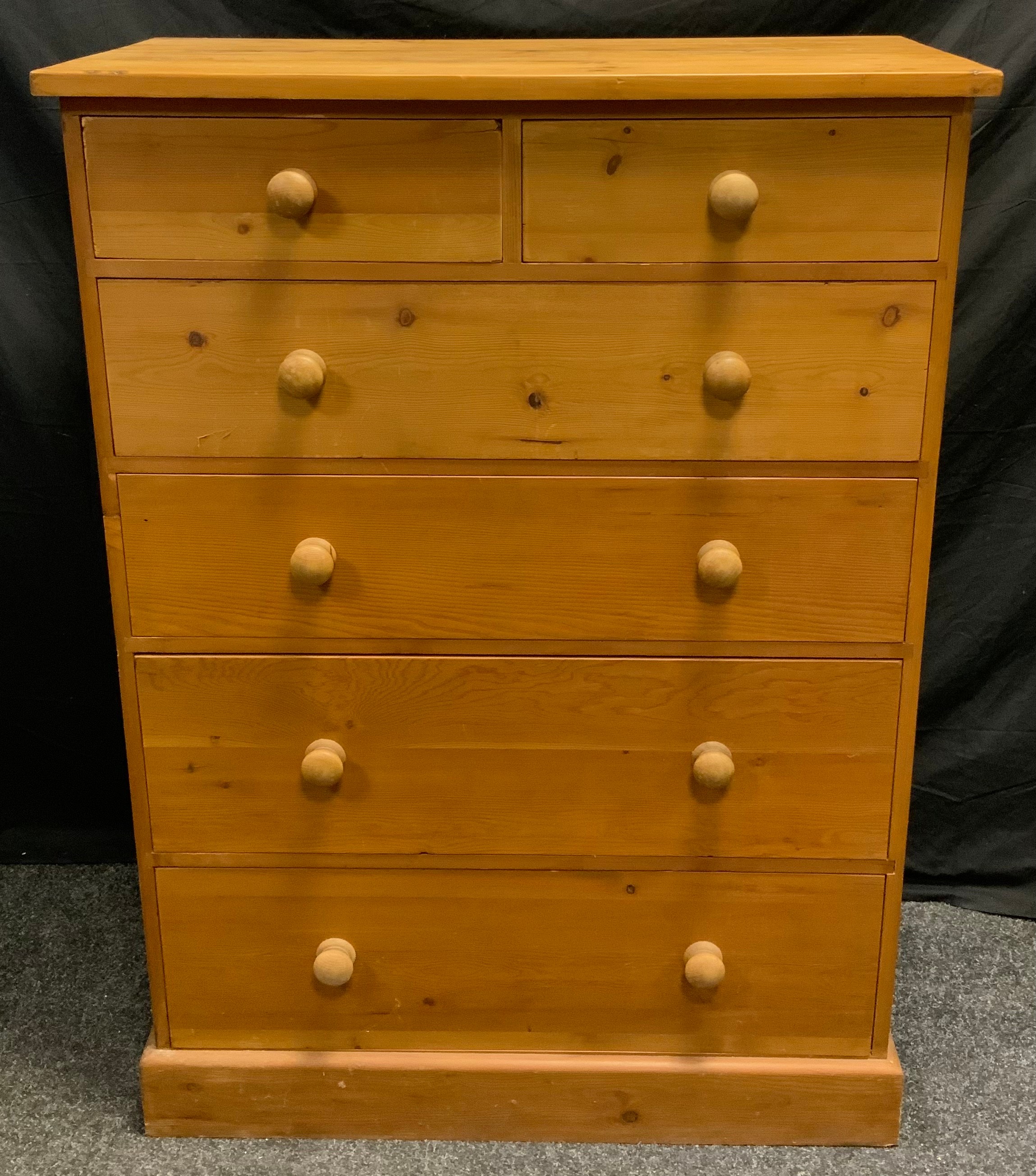 A 20th century pine chest of drawers, two short over four graduated long drawers, turned handles, - Image 2 of 2