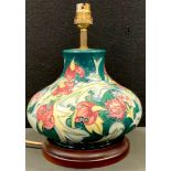 A modern Moorcroft Leicester pattern baluster table lamp, wooden plinth, 26.5cm high